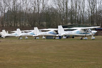 G-CDVI @ EGHP - Privately owned. In a line up of four. [L-R}: G-CDHR, G-CDMS, G-CFHP and G-CDVI - by Howard J Curtis