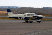 G-DIXY @ EGFH - Visiting Cherokee Archer III taxying for departure.