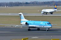 PH-KZF @ EDDL - KLM Fk70 taxiing to runway for its 30 min. hop to AMS, - by FerryPNL