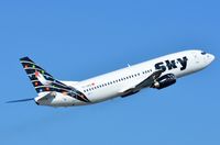 TC-SKD @ EDDL - Black Sky B734 in blue sky - by FerryPNL