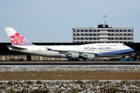 B-18212 @ EHAM - China Airlines Boeing 747-400 taxying at Amsterdam Schiphol airport. - by Henk van Capelle