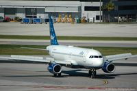 N706JB @ FLL - Taken from the Hibiscus car park viewing area. - by Carl Byrne (Mervbhx)