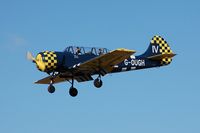 G-OUGH @ EGFH - Resident Yak-52 returning to base.