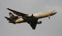 N256UP @ MCO - UPS MD-11 - by Florida Metal