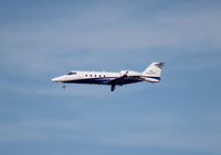 N262FX @ MCO - Flex Jet Lear 60