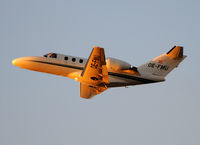 OE-FMU @ LEBL - Taking off RWY 25L.