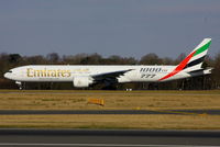 A6-EGO @ EGCC - Emirates 1000th 777 scheme - by Chris Hall