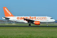 G-EZDA @ EHAM - Easyjet A319 clearing the runway - by FerryPNL