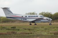 G-BVMA @ EGFH - Visiting Super King Air of Dragonfly Aviation Services backtracking prior to departure. - by Roger Winser