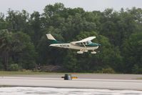 N32CW @ KLAL - Arriving at Sun N Fun 2013 - Lakeland, FL - by Bob Simmermon