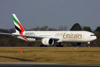 A6-EGO @ EGCC - Emirates 1000th 777 scheme - by Chris Hall