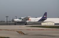 N843FE @ KMKE - Cessna 208B