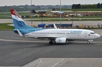 LX-LGR @ EGBB - Taxiing to stand after arrival - by Robert Kearney