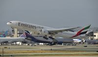 A6-ECP @ KLAX - Departing LAX - by Todd Royer