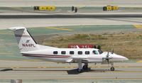 N144PL @ KLAX - Taxiing to parking - by Todd Royer