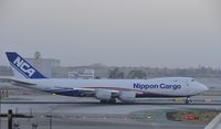 JA12KZ @ KLAX - Early morning departure from LAX - by Todd Royer