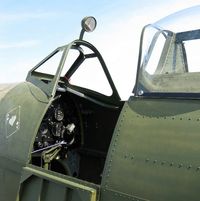 JG668 @ EGFH - Spitfire VIII fuselage on display at a fund raising visit to Swansea Airport. - by Roger Winser