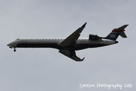 N719PS @ KSRQ - US Air Flight 2291 operated by PSA (N719PS) arrives at Sarasota-Bradenton International Airport following a flight from Charlotte-Douglas International Airport - by Donten Photography