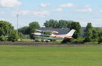 N8228M @ 10D - Cessna 182P Skylane landing on runway 27 in Winsted, MN. - by Kreg Anderson