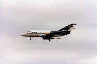 N902FR @ EGQK - Falcon 20DC of FRA on approach to RAF Kinloss in September 1990. - by Peter Nicholson