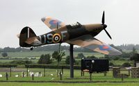 V7313 @ EGSX - Full sized replica of a Hawker Hurricane of the markings of the RAF’s 56 Squadron, as flown by 249 pilot Tom Neil during the Battle of Britain in September 1940. - by Clive Glaister