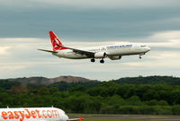 TC-JYG @ EGPH - Crossing the 06 threshold on arrival from Istanbul. easyJet A319 waiting to depart. - by David R Bonar