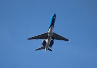 N949AT @ MCO - Air Tran Orlando Magic belly shot as it flies over Orlando Executive Airport - by Florida Metal