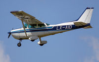 LX-AID @ ELLX - on final RW24 - by Friedrich Becker