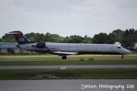 N710PS @ KSRQ - US Air Flight 2291 operated by PSA (N710PS) arrives at Sarasota-Bradenton International Airport following a flight from Charlotte-Douglas International Airport - by Donten Photography