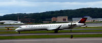 N909XJ @ KDCA - Landing roll DCA check the thrust reversers - by Ronald Barker