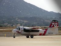 N427DF @ KRNM - ex Grumman Tracker modified, presumably, by Marsh Aviation.  It has also been re engined with Honeywell turboprops as the original had  2 × Wright R-1820-82WA radial engines.  Used for fire fighting. - by Nick Lindsley