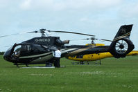 G-WCKD @ EGBT - being used for ferrying race fans to the British F1 Grand Prix at Silverstone - by Chris Hall