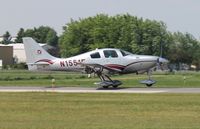 N1551F @ KAXN - Columbia 400 landing on runway 31. - by Kreg Anderson