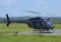 G-TFHW @ EGFP - Bell 206B, spooling down on the apron at Pembrey. - by Derek Flewin