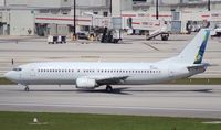 N238AG @ MIA - Fly Guam (Sky King) 737-400 - by Florida Metal