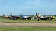 G-CDWH @ EGSU - 5. 284 - (L to R) - P40F with P40B, P51C and P51D at the IWM Spring Airshow, Duxford May 2013. - by Eric.Fishwick