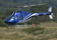 G-ENES @ EGFH - Visiting Bell 206B, parked on the Heli Med stand, departed 20 minutes later to the East. - by Derek Flewin