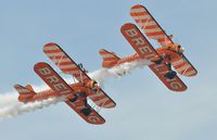 N707TJ - Off airport. Breitling 4 (N707TJ) leading Breitling 3 (SE-BOG) on the first day of the Wales National Air Show, Swansea Bay, UK. The Boeing Stearman Kaydet biplanes are operated by Aerosuperbatics and they put on a superb display. - by Roger Winser