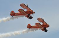 SE-BOG - Off airport. Breitling Wingwalkers with SE-BOG (3) in line abreast formation with N707TJ (4) displaying on the first day of the Wales National Air Show, Swansea Bay, UK. - by Roger Winser