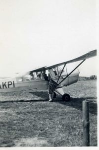 G-AKPI - My brother in law, Alan Brown, having a pleasure flight probably at Sywell, Northants circa 1959. Mrs I M Brown, decd, in aircraft doorway. - by Dr Harold Brown (decd)