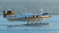 C-GUTW @ CYHC - Harbour Air #302 with an early morning departure in Coal Harbour. - by M.L. Jacobs