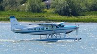 C-FJOE @ CYVR - Seair Seaplanes Cessna just landed on the Fraser River. - by M.L. Jacobs