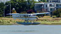 C-GLCP @ CYVR - Harbour Air #311 landing on the Fraser River. - by M.L. Jacobs