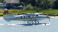 C-GLCP @ CYVR - Harbour Air #311 taxiing to the Fraser River terminal. - by M.L. Jacobs