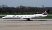 N267SK @ KCMH - A sleek United Express E-jet taxies by at Port Columbus International. - by Daniel L. Berek