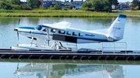 C-FJOE @ CYVR - Seair Seaplanes Cessna tied at the dock on the Fraser River. - by M.L. Jacobs