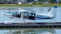 C-FLAC @ CYVR - Seair Seaplanes Cessna at the Fraser River terminal dock and ready for the next flight. - by M.L. Jacobs