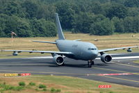 10 25 @ EDDK - Leaving rwy 32R taxi into A5 for transfer to military part of CGN.... - by Holger Zengler