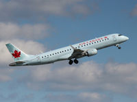 C-FLWH @ CYYZ - This 2007 Embraer 190 climbs off runway 05 at Toronto Int'l Airport (YYZ) - by Ron Coates