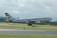 A6-EYS @ EGCC - Etihad Airbus A330-243 taking off from Manchester Airport. - by David Burrell